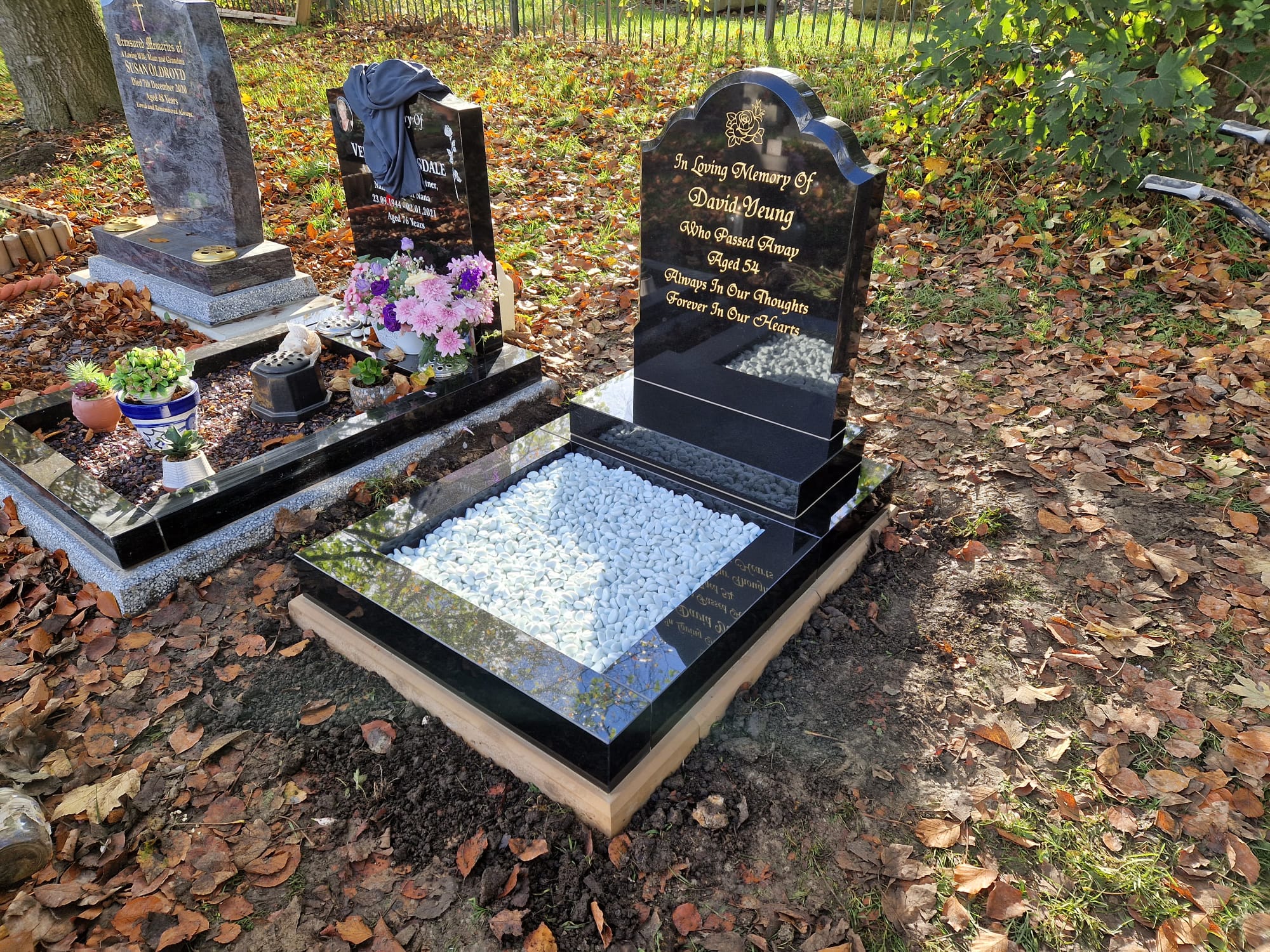 Black Granite Arch Top Headstone with Kerb Surround Installed by Northern Headstones
